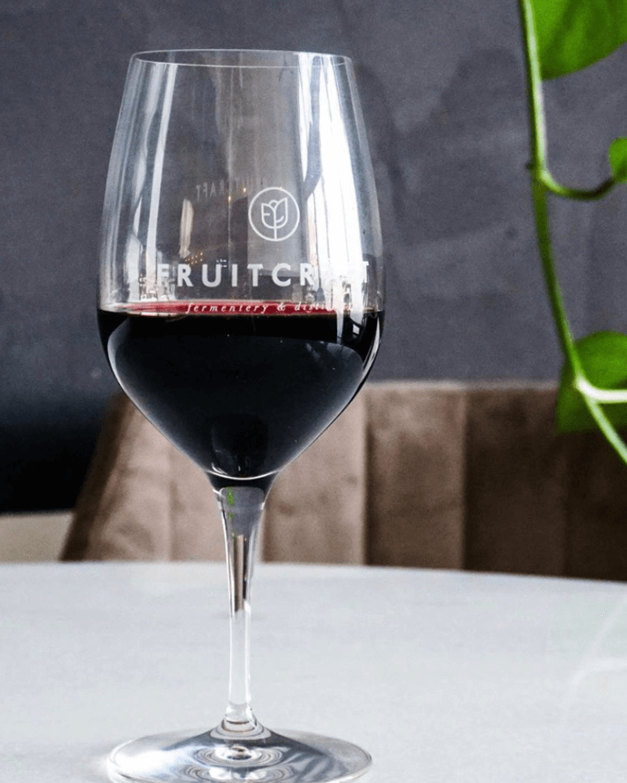 Red wine served in a clear glass at FruitCraft